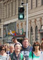 Pedestrian light featuring lesbian couple