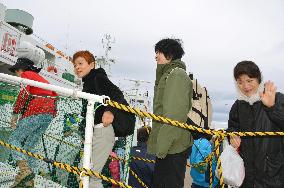Japanese people leave for Russian-held isles for year's 1st visa-free visit