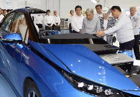 Emperor, empress visit Toyota Motor Corp. plant