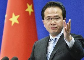 China defends spy ship's activities near Japan's Senkakus