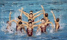 Japan advances past preliminary round in free combination