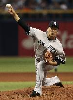 Tanaka delivers with 7 scoreless innings