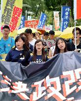 Thousands in H.K. march to protest electoral reform proposal