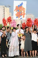 N. Koreans cheer anniversary march marking end of Japanese rule