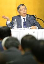 BOJ Kuroda urges businesses to raise wages for employees