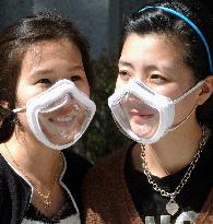 Transparent masks put on sale for protection from yellow sand