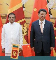 Sri Lankan Pres. Sirisena meets with Chinese Pres. Xi