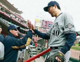 Brewers' Saito makes season debut