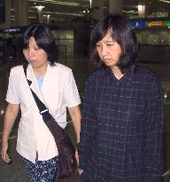 Wife of detained Japanese NGO leader arrives in Shanghai