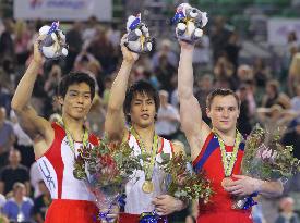 Japan's Tomita clinches overall gold at gymnastic worlds