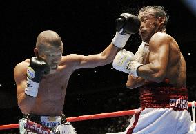 Kameda 1st Japanese boxer to win 3 world titles