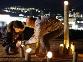 People mourn August 2014 Hiroshima landslide victims