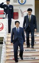 Abe returns home after attending Asia-Africa summit in Jakarta