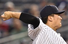 Tanaka pitches against Orioles