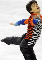 Switzerland's Lambiel defends title at world figure skating