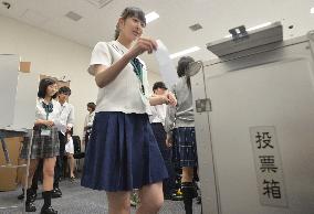 Japan's parliament enacts law lowering voting age from 20 to 18