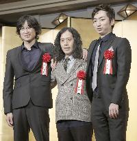 Winners of prestigious literary prizes pose at ceremony