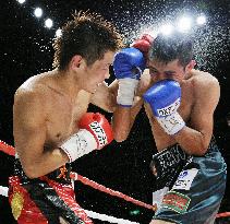 Hasegawa wins WBC featherweight title