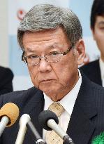 Okinawa defends order to suspend work in row over base transfer