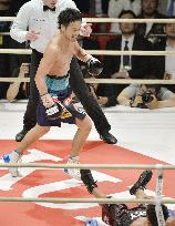 Japan's Yamanaka gets 7th-round KO in 8th defense of WBC bantam title