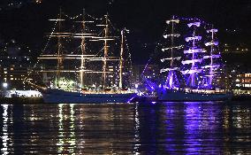 Japanese, Russian sailboats illuminated at Nagasaki port festival