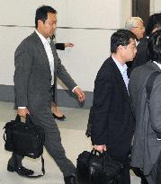 3 Japanese released by China return home