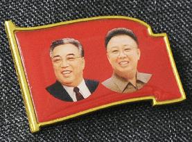North Korea reported making new badge with current leader added