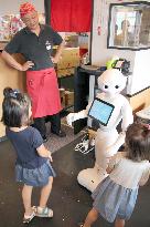 Humanoid robot debuts as 'honorary manager' of noodle shop