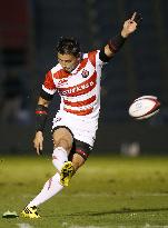 Japan rugby team's Goromaru kicks at Chichibunomiya stadium