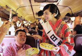 Yuka greets fans on steam locomotive