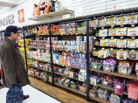 Tokyo store shelves full of canned foods before 4th anniv. of 2011 disaster