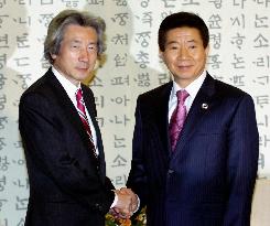 Koizumi, Roh agree on importance of resolving N. Korea nuke issu