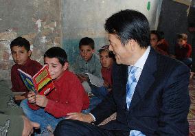 Okada visits Kabul high school