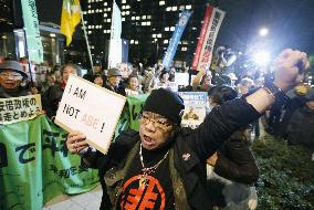 Citizens protest in Tokyo against planned defense policy changes