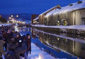 Streets, canal lit up at winter event in northern Japan town