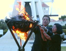 People pray for Battle of Okinawa victims