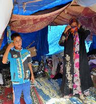 Mother, son from Fallujah live in camp in Latifiya