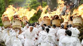 Big torches feature at Kumano shrine fire festival in western Japan