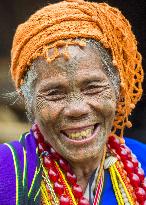 Myanmar's Chin tribe woman shows facial tattoos