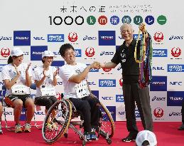 Tokyo governor gets sash after end of 1,000-km Aomori-Tokyo relay