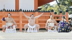 Grand champion Hakuho performs ring-entering rite at Osaka shrine