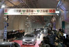 Cars in tunnel at opening ceremony for loop expressway in Tokyo