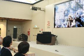 People watch film on 19th-century Japanese "haiku" poet at Expo Milano