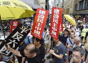 People in Hong Kong march for democracy