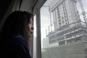 Beijing woman says her house expropriated without due process of law