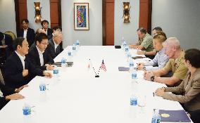 Suga visits Guam for talks with U.S. commander
