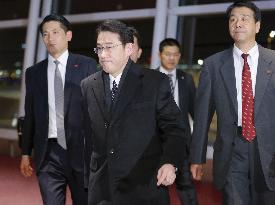 Japanese foreign minister returns home after historic accord with S. Korea