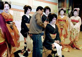Geisha dancers dress up for 'Kitano Odori' performance in Kyoto