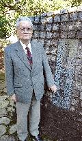 Ex-member of WWII Imperial Guard stands by monument