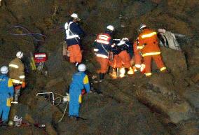 Rescue squad keeps trying to save girl in car buried by quake